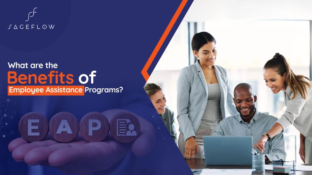 four diverse business professionals smiling , discussing about “EAP” and collaborating around a laptop in an office setting.